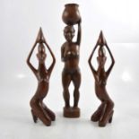 Small collection of African carved wood artifacts.