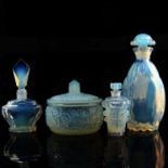 Sabino opalescent glass powder pot with lid, and three scent bottles.