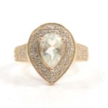 A very pale blue quartz and diamond pear shaped cluster ring.