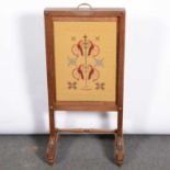 Edwardian stained beech and mixed wood fire screen.