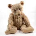 Steiff Teddy bear, early 20th century, with original Steiff button to ear, long mohair fur
