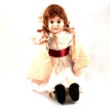 Large bisque head doll, head stamp E.N.ST, 12, Kid leather body, with bisque limbs