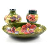 Moorcroft Pottery Clematis bowl, Columbine squat vase and Hibiscus lidded ginger jar.