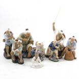 Eight Chinese part glazed figures,