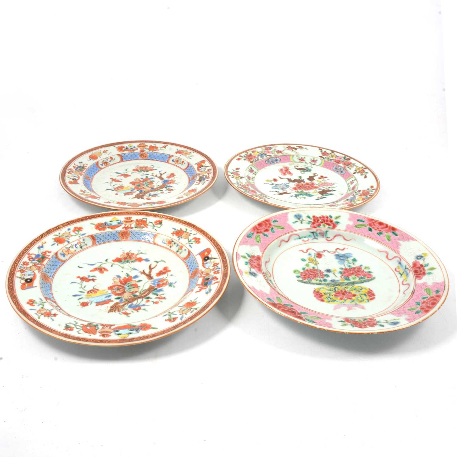 Pair of Chinese soup plates and two famille rose plates,