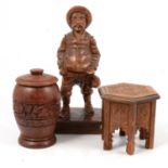 Wooden pen tray, lidded pots, figures, and other items.