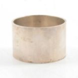 Silver napkin ring, Braybrook & Britten, London 2002, and 1/12 Reichs Thaler, 1767.