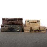 Four vintage card suitcases.