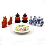 Three terracotta seated cats, five small blue and white double gourd vases,