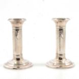 A pair of silver candlesticks in the Adam style by Ellis & Co (Ellis Jacob Greenberg)