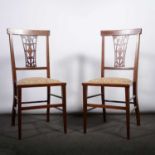 Pair of Edwardian mahogany and marquetry salon chairs, pierced vase splats, upholstered seats,