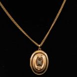 A 9 carat gold locket and chain, B&F locket, two rings, pearl drop.