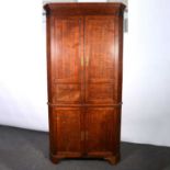 Large late Georgian oak freestanding corner cupboard,