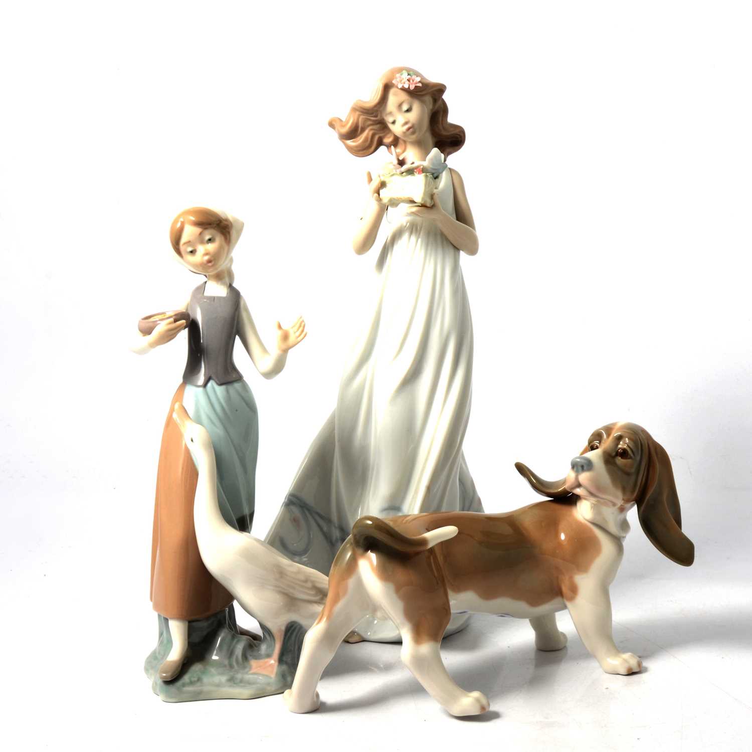 Three Lladro figurines.