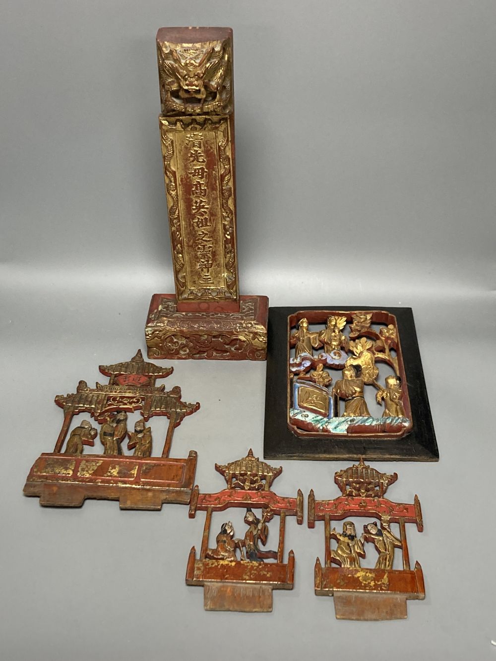 A group of Chinese lacquered wood carvings, tallest 40cm