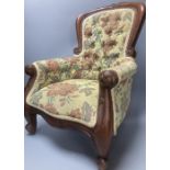 A reproduction miniature spoonback armchair