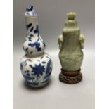 A 19th century Chinese blue and white double gourd shaped vase and cover and a green hardstone