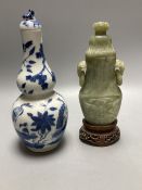 A 19th century Chinese blue and white double gourd shaped vase and cover and a green hardstone