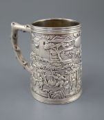 A 19th century Chinese Export silver mug, by Khecheong?, embossed with continuous scene of figures