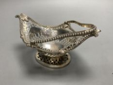 A late Victorian pierced silver boat shaped bonbon basket, Charles Stuart Harris, London, 1890,