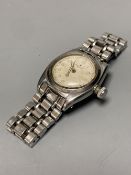 A gentleman's 1930's/1940's? stainless steel mid size Rolex manual wind wrist watch, with signed