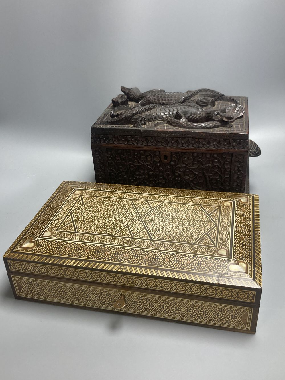 A Middle-Eastern mosaic box inlaid in bone and mother of pearl, 31.5cm and a carved padouk box,