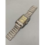 A gentleman's 1940's? stainless steel Omega manual wind wrist watch, with rectangular Arabic dial