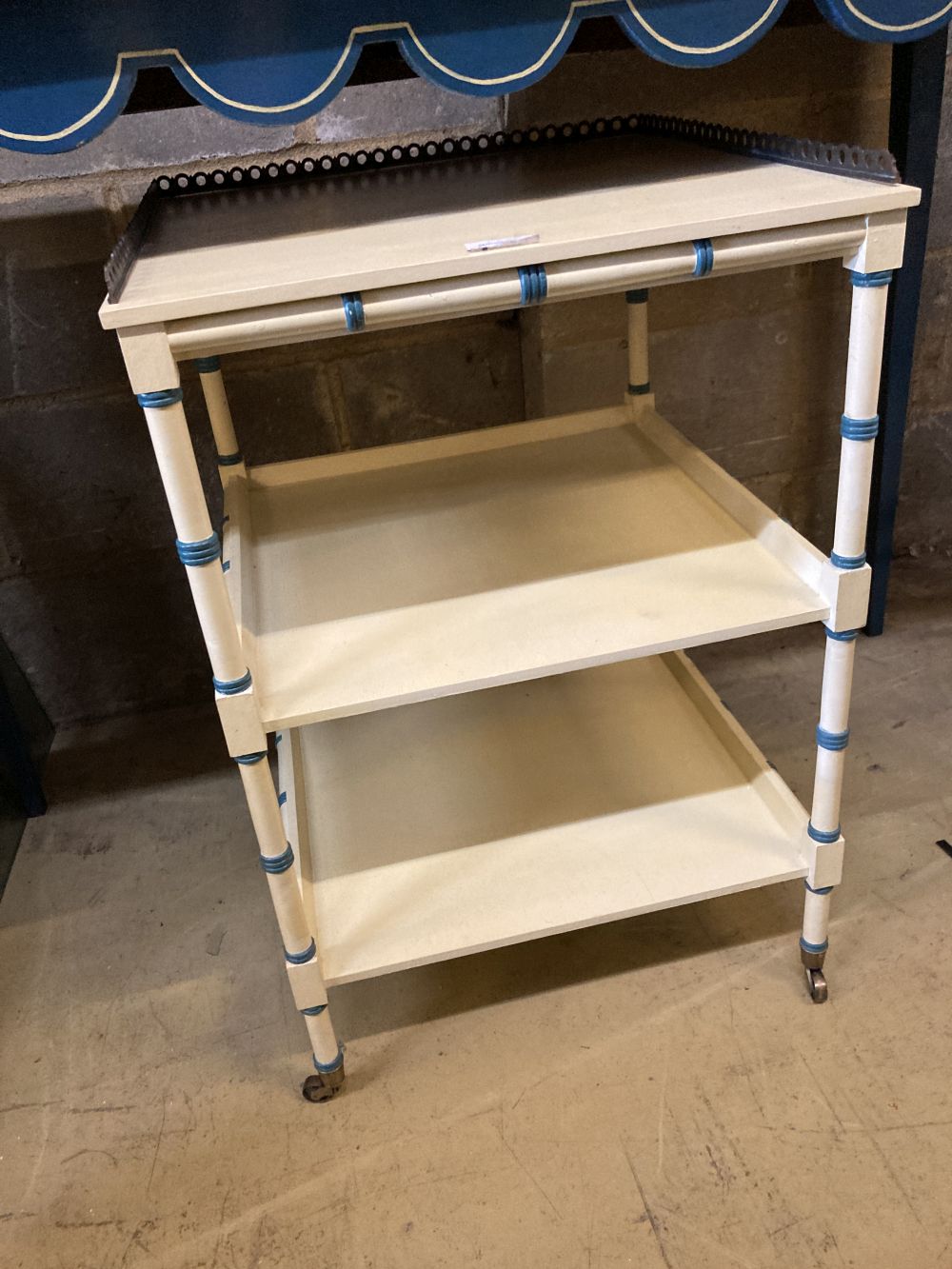 A Regency style cream painted three tier bedside table, a blue painted white lined dressing table ( - Image 2 of 4