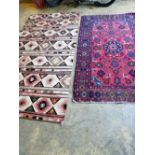 A red ground Hamadan rug and a Kelim rug, larger 210 x 130cm