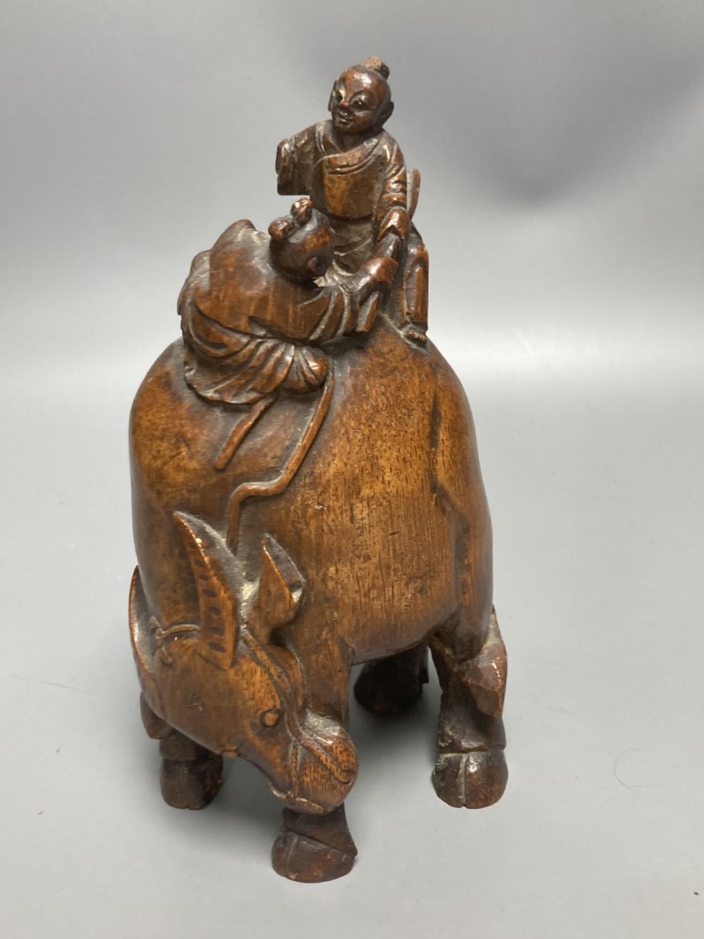 A Chinese bamboo group of figures on an ox and a wrist rest, 23 and 17cm - Image 4 of 7