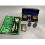 A pair of oval silver salts and spoons (cased), a butter knife and preserve spoon (cased), two