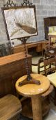 An Art Deco maple and walnut circular two tier table, fitted slides, diameter 60cm, height 62cm