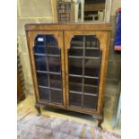 A 1920s Queen Anne revival bookcase, width 78cm, depth 26cm, height 108cm