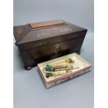 A Victorian mother of pearl-inlaid rosewood sewing box, containing various accessories, lace