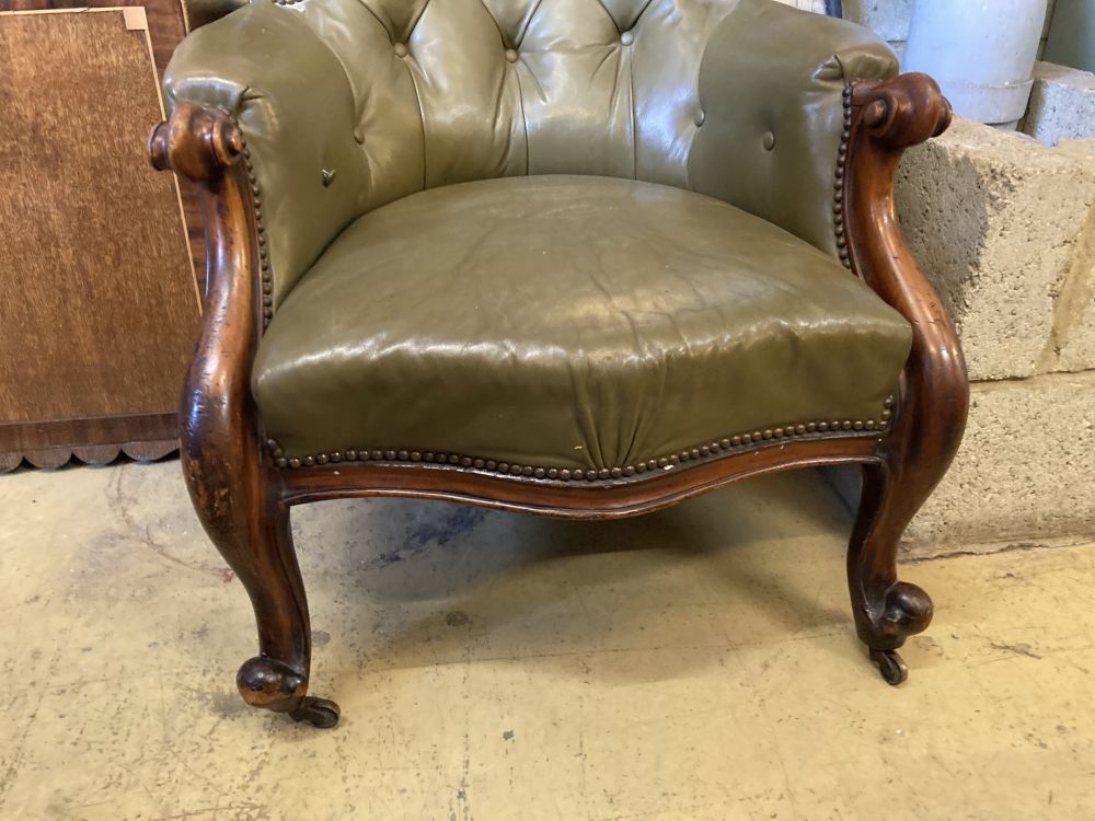 A Victorian carved and moulded showood frame spoonback armchair on scrolled legs, upholstered in - Image 2 of 3