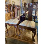 Two early 18th century walnut dining chairs