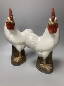 A pair of Chinese porcelain models of cockerels, mid 20th century, 34.5cm high