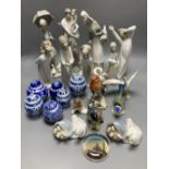 A collection of Lladro and Goebel porcelain figures and other items