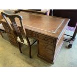 A late Victorian mahogany pedestal desk, width 138cm, depth 71cm, height 74cm together with an Art