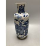 A late 19th century Chinese blue and white rouleau vase, height 25cm