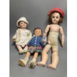 An Armand Marseille bisque boy doll, mould 990 with fixed glass eyes, 30cm, a bisque doll with