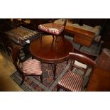 An early 20th century mahogany centre table, 105cm diameter together with four early Victorian