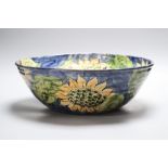 A Paul Jackson studio pottery Sunflower bowl, signed, diameter 36cmCONDITION: There is crazing