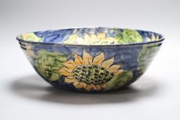 A Paul Jackson studio pottery Sunflower bowl, signed, diameter 36cmCONDITION: There is crazing