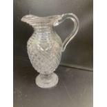 A George IV step and hobnail cut glass ewer, c.1830, 26cm, crack to handleCONDITION: Andrew Rudebeck