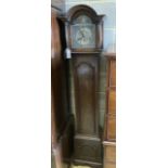 A 1930's/40's oak grandmother clock having Whittington/Westminster chimes, height 176cm
