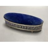 A navette-shaped silver trinket box with fretwork sides and hinged pin cushion top, Birmingham 1900,