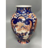 A large Imari porcelain vase, bulbous shape, 25cm