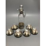 An Edwardian silver mounted glass seven piece liqueur set, by Hukin & Heath, Birmingham, 1906,