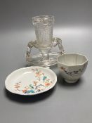 A Japanese Kakiemon dish, 17th century, a similar wine cup, 18th century and a Chinese glass vase